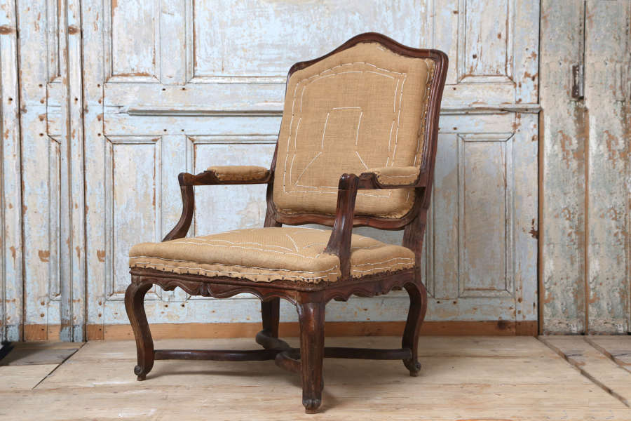 French 18th century fruitwood Regence armchair
