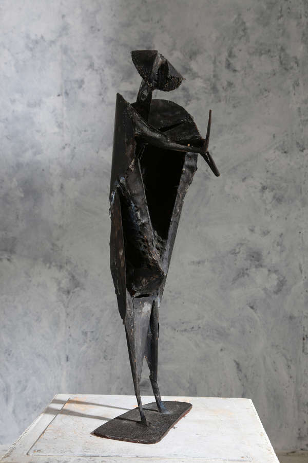 20th century metal sculpture in the style of Lynn Chadwick