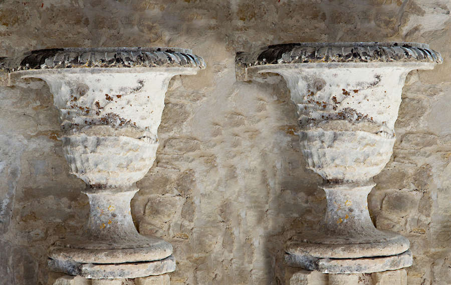 Pair of 18th century French Regence stone urns